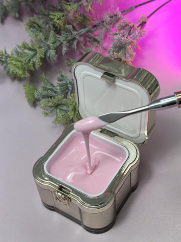 Lemmy Builder Gel 11 - Cotton Pink in jar with spatula, ideal for nail strengthening and salon lengths, self-leveling creamy texture.