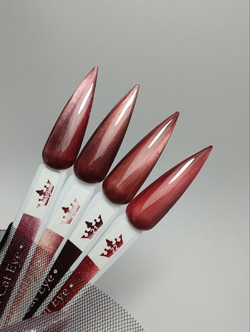 Гел лак Lux Cat Eye - 19 в червено розови нюанси и медно кафеви отенъци, показан на мостри с ефект на котешко око.